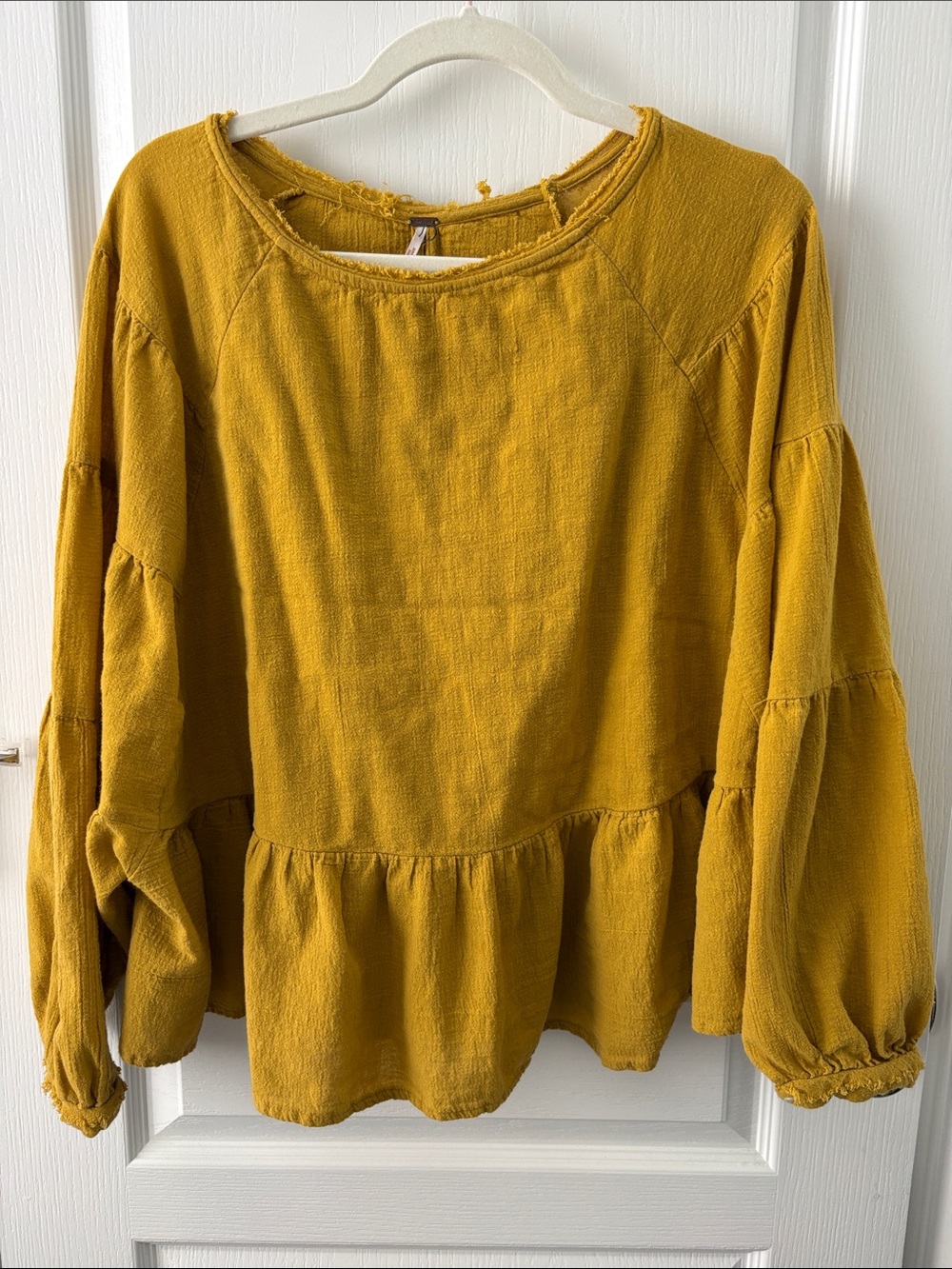 Free People Mustard Peplum Blouse with Balloon Sleeves Raw Hem.